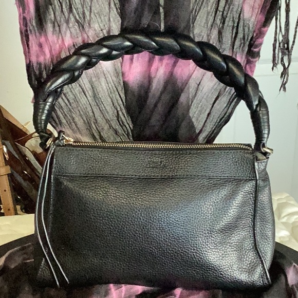 Vince Camuto Handbags - Vince Camuto small pebbled leather handbag with a braided strap and small tassel